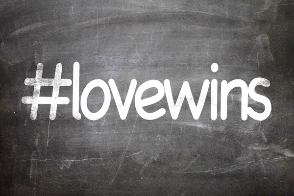 Hashtag lovewins on a chalkboard — Stock Photo, Image