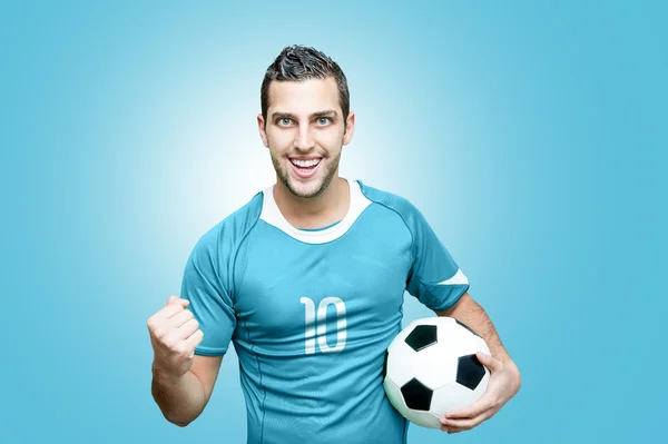 Ventilador de futebol celebra em camiseta azul — Fotografia de Stock