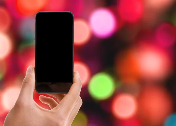 Ruka držící chytrý telefon s černou obrazovkou — Stock fotografie