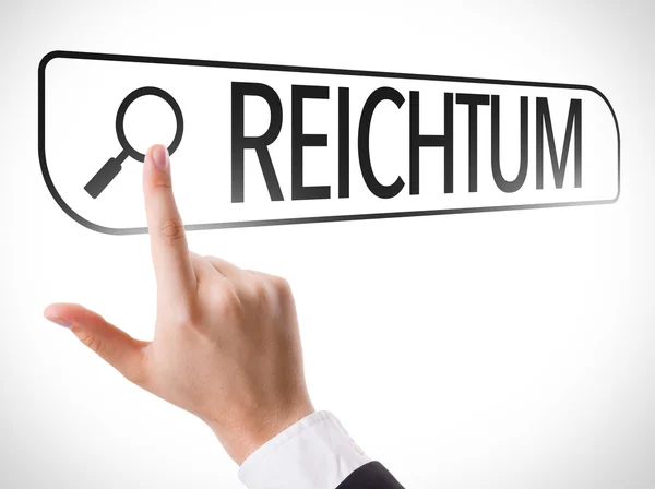 Reichtum in Suchleiste geschrieben — Stockfoto