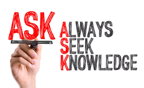 Hand with marker writing the words