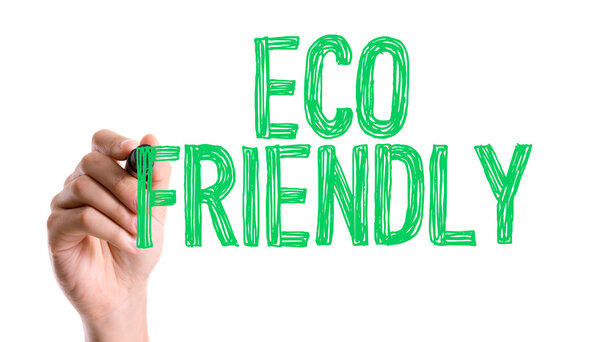 Hand with marker writing the words