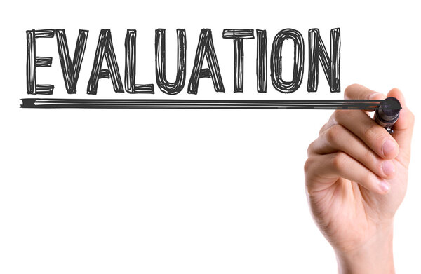 Рука с маркером пишет слово
