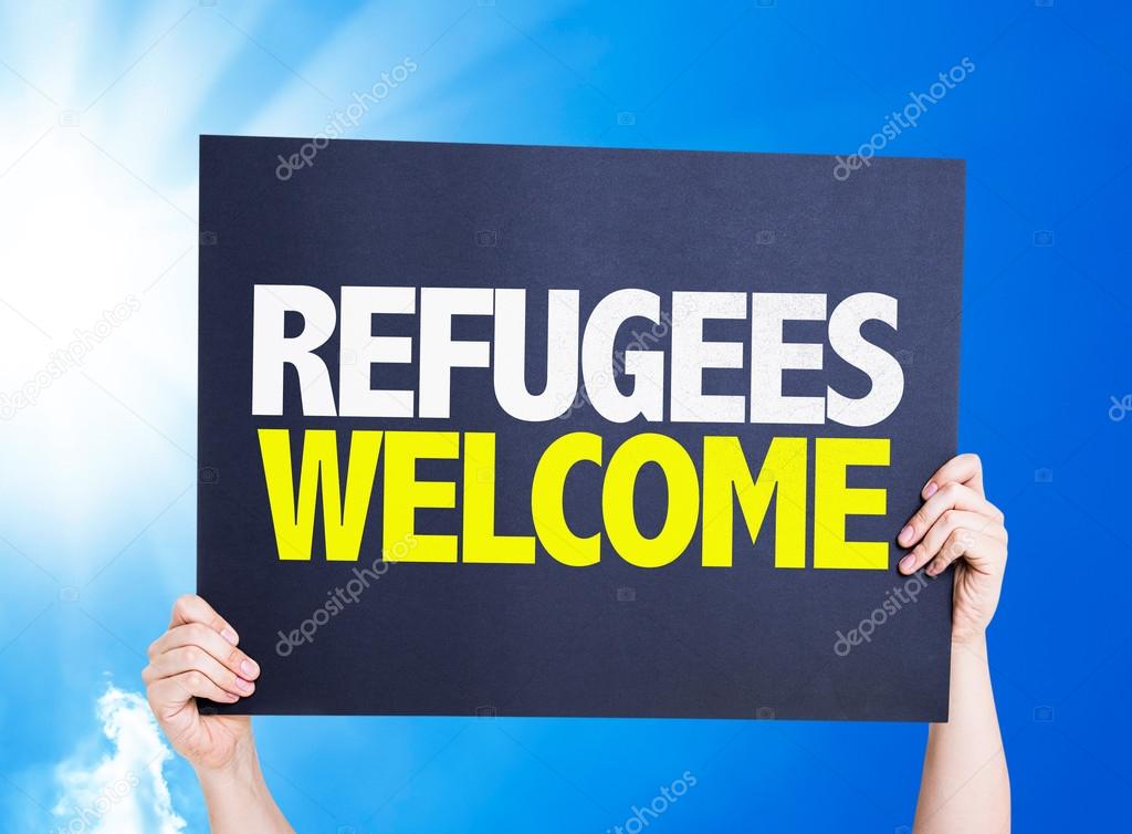 Refugees Welcome placard