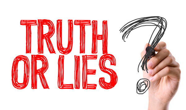 Hand with marker writing the text