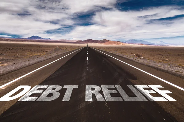 Debt Relief  on desert road — Stock Photo, Image