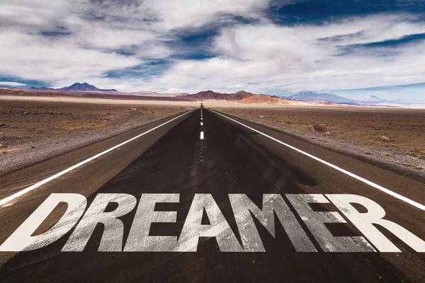 Dreamer on desert road — Stock Photo, Image