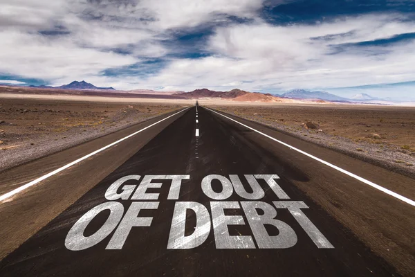 Saia da dívida na estrada do deserto — Fotografia de Stock