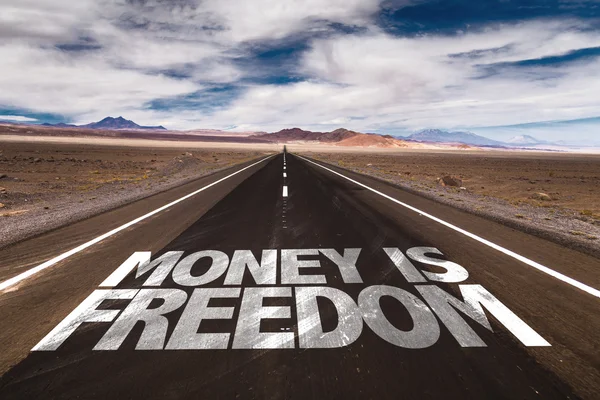 Money is Freedom on desert road — Stock Photo, Image