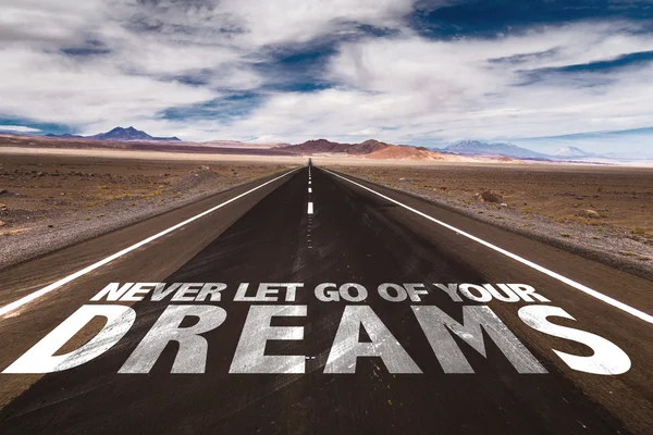 Never Let Go Of Your Dreams on road — Stock Photo, Image