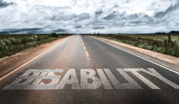 Disabilità scritta su strada rurale — Foto Stock