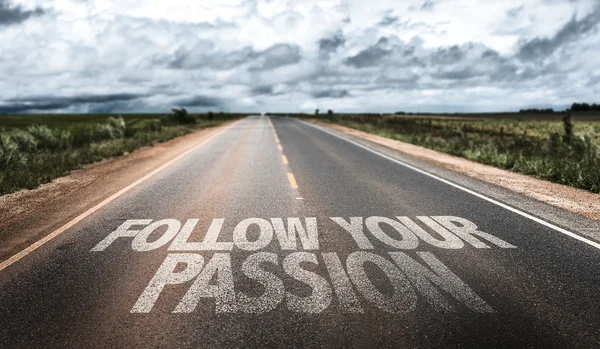 Follow Your Passion on rural road — Stock Photo, Image