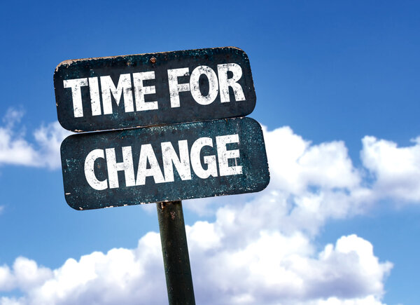 Time For Change sign with sky background