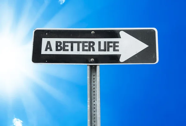 Znak kierunku lepszego życia — Zdjęcie stockowe