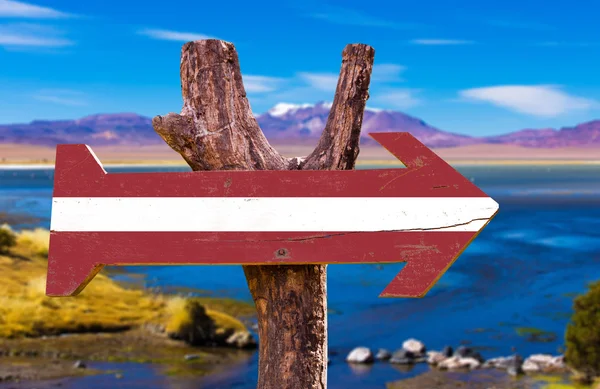 Latvia flag wooden sign — Stock Photo, Image