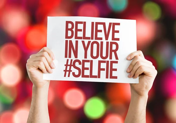 Believe In Your # Selfie placard — стоковое фото