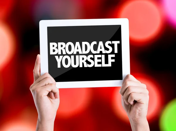 Tablet pc with text Broadcast Yourself — Stock Photo, Image