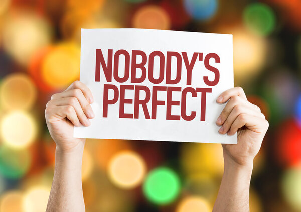 Nobody 's Perfect placard
