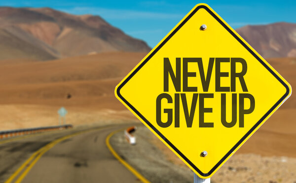 Never Give Up sign