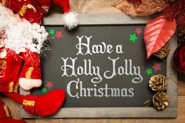 Pizarra con el texto: Tener una Navidad Holly Jolly — Foto de Stock