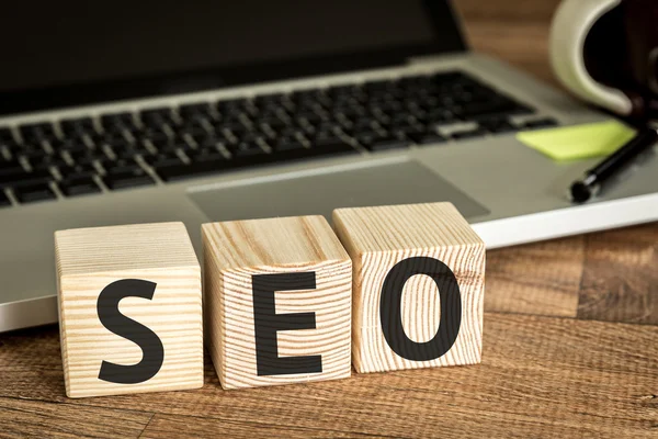 SEO written on a wooden cubes — Stock Photo, Image