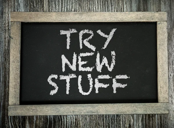 Try New Stuff on chalkboard — Stock Photo, Image