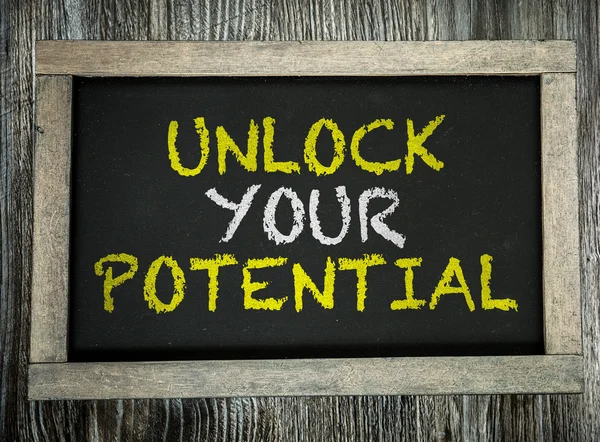 Unlock Your Potential on chalkboard — Stock Photo, Image