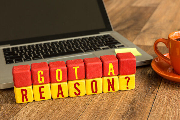 получил причину, написанную на деревянных кубиках
