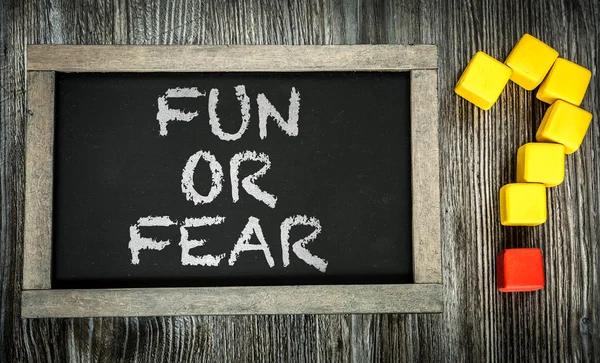 Plezier of angst? op schoolbord — Stockfoto