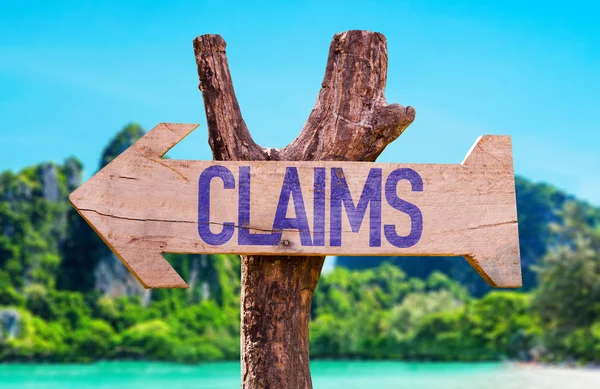 Claims wooden arrow — Stock Photo, Image