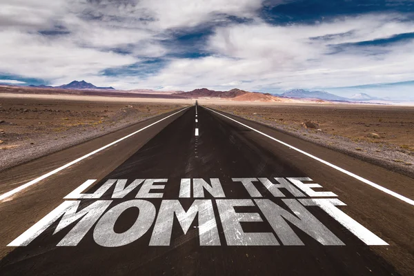 Live in the Moment written on road — Stock Photo, Image