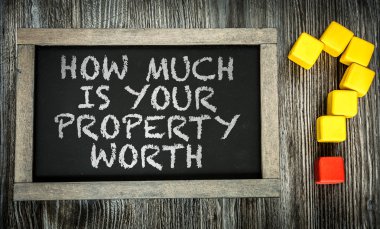 How Much is Your Property Worth? on chalkboard clipart