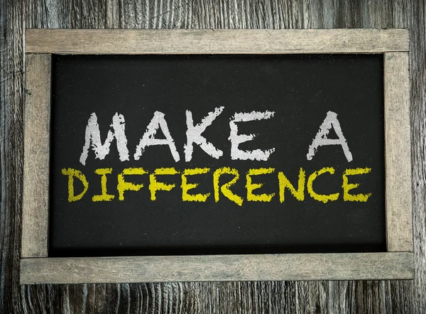 Make a Difference on chalkboard — Stock Photo, Image