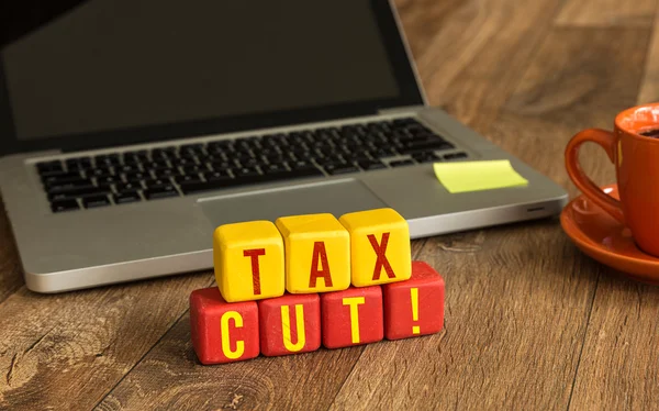 Tax Cut written on a wooden cubes — Stock Photo, Image