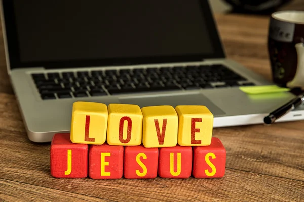 Love Jesus written on a wooden cubes — Stock Photo, Image