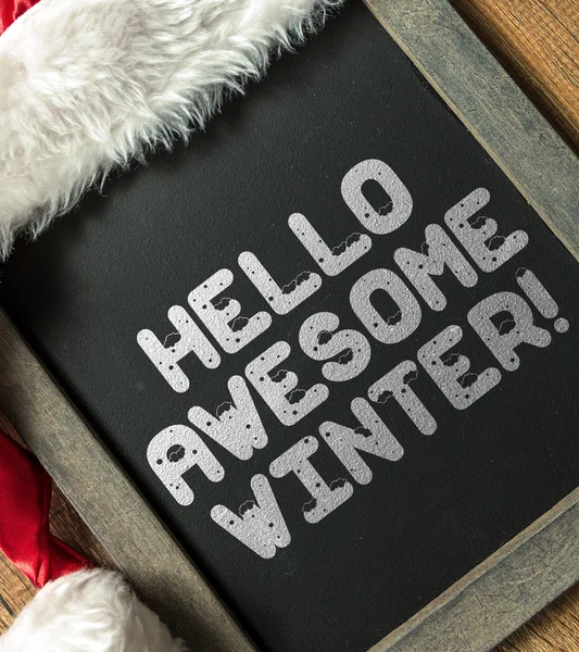 Hello Awesome Winter written on blackboard — Stock Photo, Image