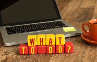 What To Do? written on cubes clipart