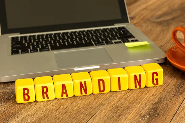 Branding auf Würfel geschrieben — Stockfoto