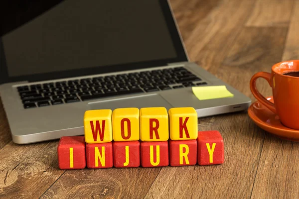 Work Injury written on cubes — Stock Photo, Image