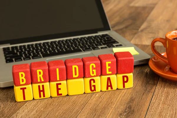 Bridge the Gap written on cubes — Stock Photo, Image