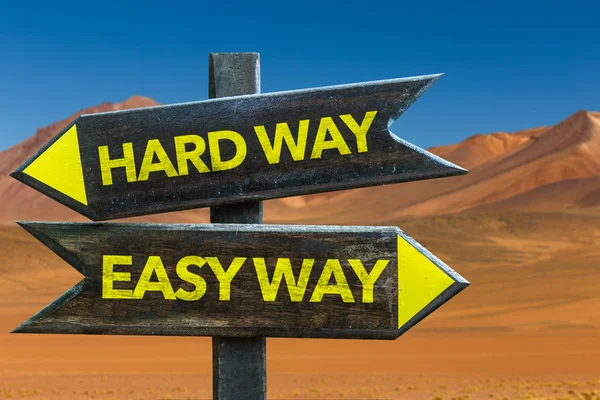 The Easy Way Or The Hard Way Hard Way Easy Way signpost — Stock Photo © gustavofrazao #91095974