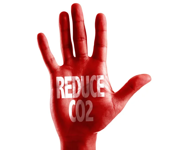 Reduzir o CO2 escrito na mão — Fotografia de Stock