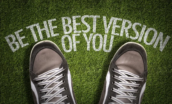 Sneakers on the grass with the text — Stock Photo, Image