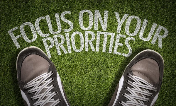 Sneakers on the grass with the text — Stock Photo, Image