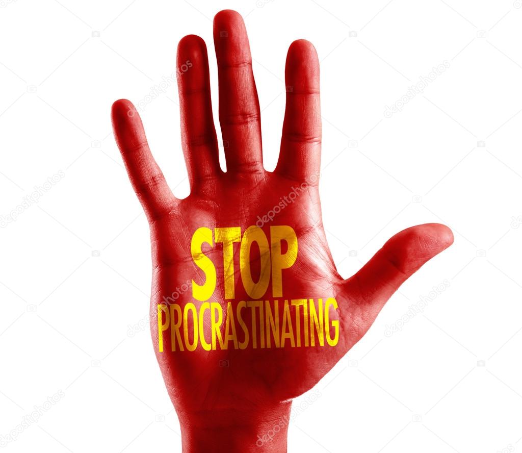 Stop Procrastinating written on hand