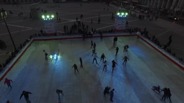 People at the Skating Rink in Square — Stock Video