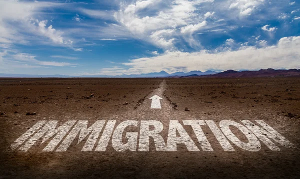 Immigration written on road — Stock Photo, Image