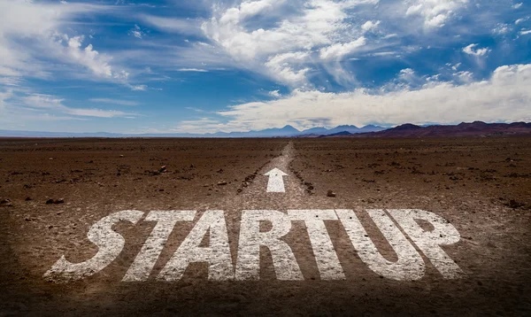 Startup written on road — Stock Photo, Image