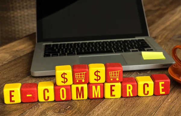 E-commerce written on a wooden cubes — Stock Photo, Image