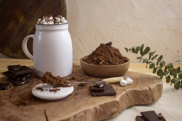 still life with chocolate on a wooden background